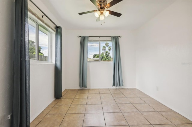 992 20th St SW, Largo, FL 33770 - unfurnished room featuring ceiling fan and light tile patterned flooring