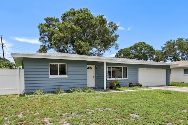 992 20th St SW, Largo, FL 33770 - single story home featuring an attached garage and driveway