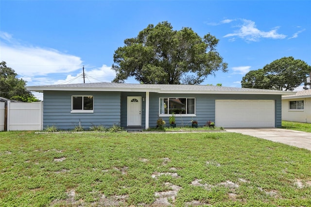 992 20th St SW, Largo, FL 33770 - ranch-style house with a garage and driveway