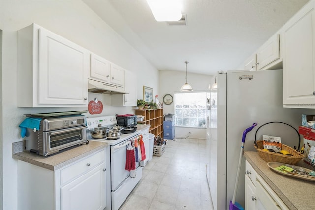 1754 Turtle Rock Dr, Lakeland, FL 33803 - kitchen featuring white appliances, under cabinet range hood, white cabinets, light countertops, and hanging light fixtures