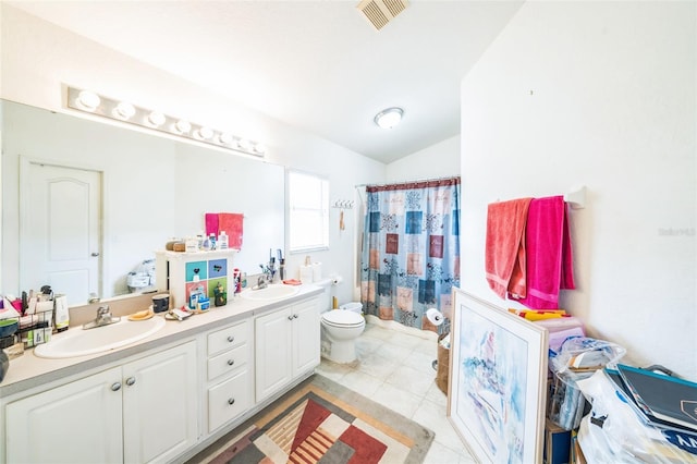 1754 Turtle Rock Dr, Lakeland, FL 33803 - full bathroom with double vanity, lofted ceiling, a shower with curtain, and tile patterned flooring
