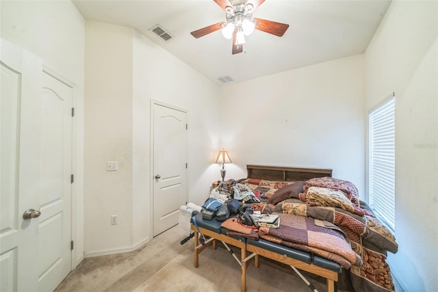 1754 Turtle Rock Dr, Lakeland, FL 33803 - bedroom with light colored carpet and ceiling fan