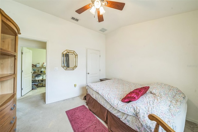 1754 Turtle Rock Dr, Lakeland, FL 33803 - bedroom featuring light colored carpet and a ceiling fan