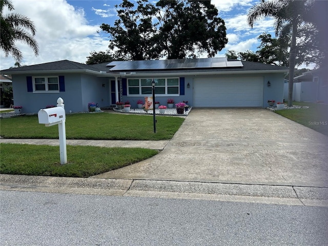 3260 Parkway Pl, Palm Harbor, FL 34684 - ranch-style home featuring an attached garage, a front lawn, stucco siding, and concrete driveway