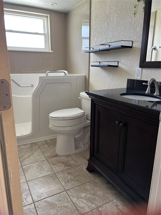 3260 Parkway Pl, Palm Harbor, FL 34684 - bathroom with vanity and a textured ceiling