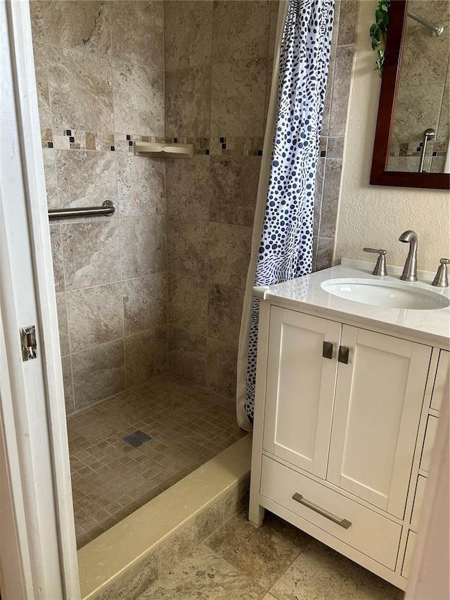 3260 Parkway Pl, Palm Harbor, FL 34684 - bathroom featuring a stall shower and vanity