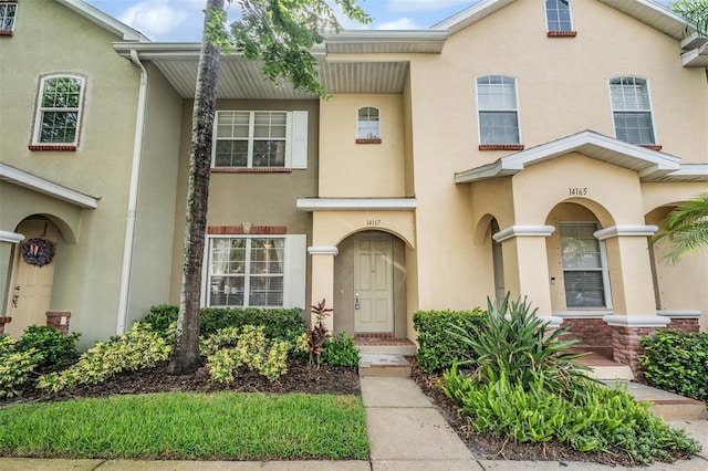 14167 Stilton St, Tampa, FL 33626 - townhome / multi-family property featuring stucco siding