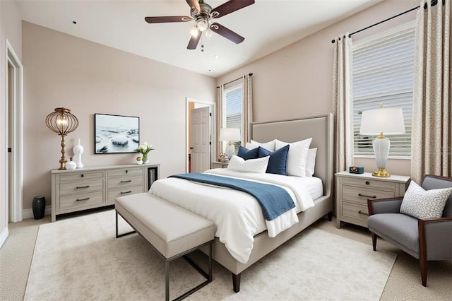 14167 Stilton St, Tampa, FL 33626 - bedroom with light colored carpet and ceiling fan