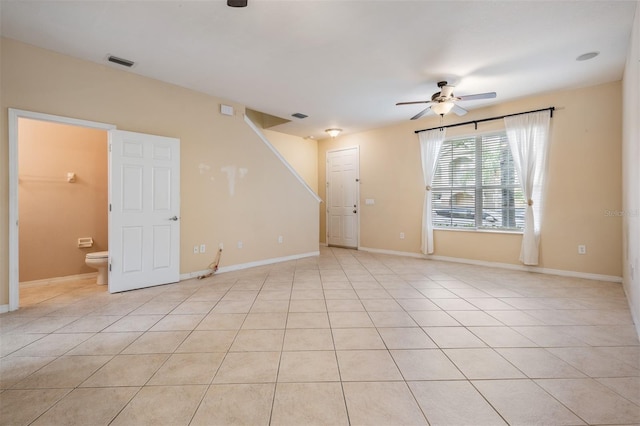 14167 Stilton St, Tampa, FL 33626 - empty room featuring a ceiling fan and light tile patterned floors
