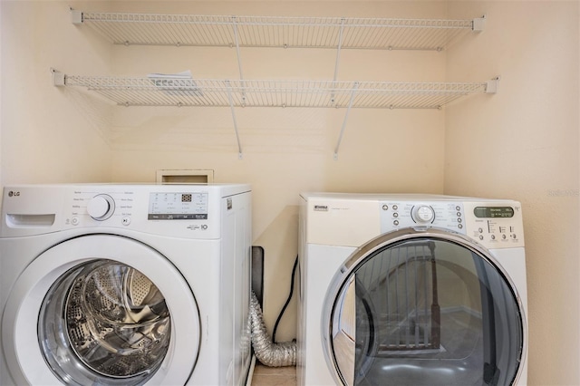 14167 Stilton St, Tampa, FL 33626 - laundry area with washer and dryer