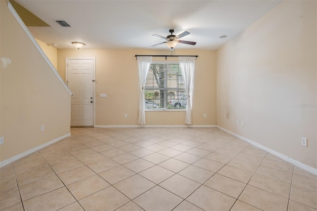 14167 Stilton St, Tampa, FL 33626 - empty room featuring ceiling fan and light tile patterned floors