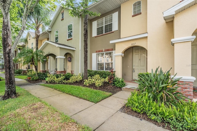 14167 Stilton St, Tampa, FL 33626 - view of property with stucco siding