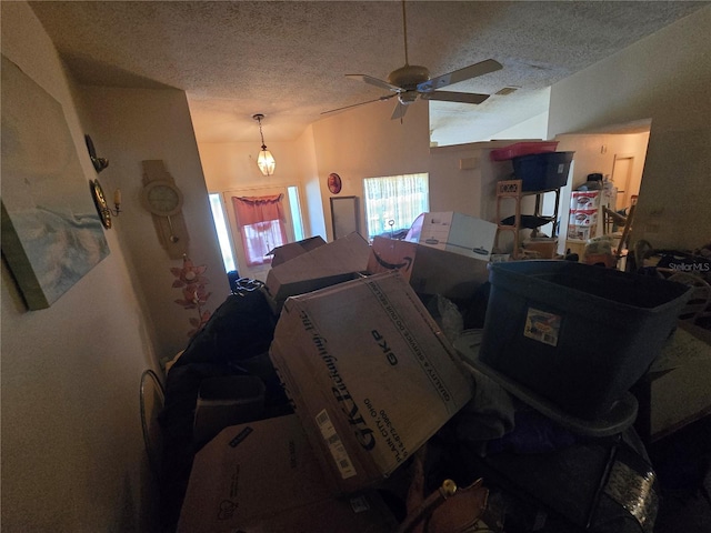 8548 Cypress Lakes Blvd, New Port Richey, FL 34653 - living area with lofted ceiling, a textured ceiling, and a ceiling fan