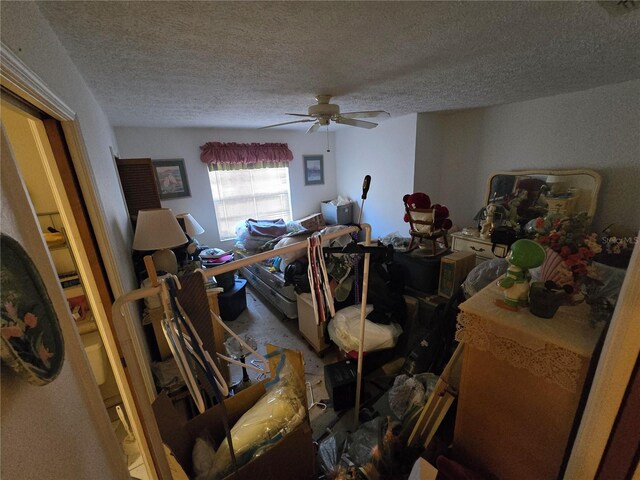 8548 Cypress Lakes Blvd, New Port Richey, FL 34653 - living room featuring a ceiling fan and a textured ceiling