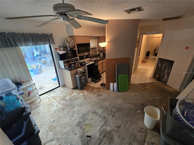 8548 Cypress Lakes Blvd, New Port Richey, FL 34653 - living area with a textured ceiling and ceiling fan