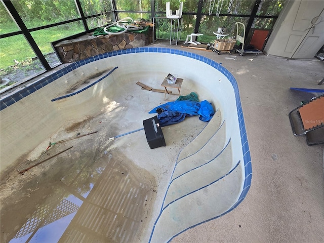 8548 Cypress Lakes Blvd, New Port Richey, FL 34653 - view of swimming pool featuring glass enclosure