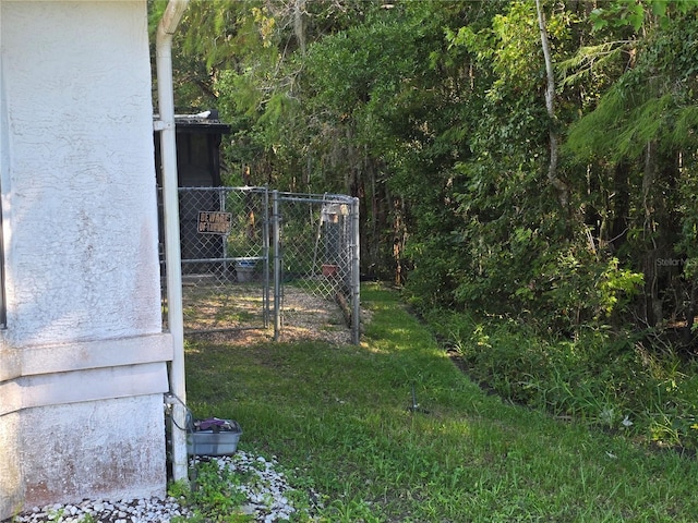 8548 Cypress Lakes Blvd, New Port Richey, FL 34653 - view of yard featuring a gate