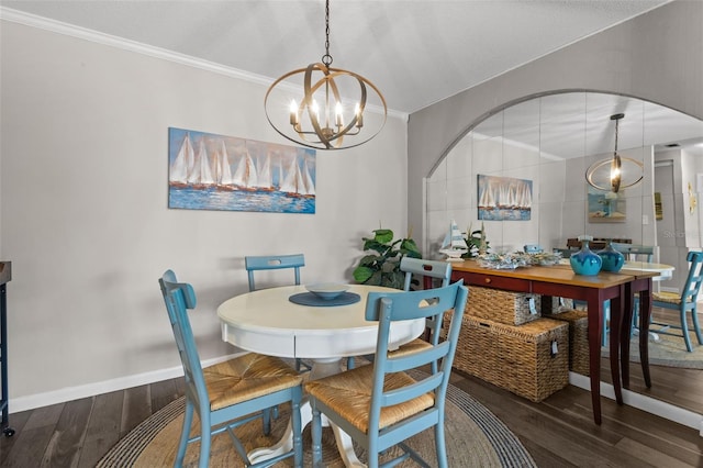 2700 Bayshore Blvd Unit 2312, Dunedin, FL 34698 - dining area featuring wood finished floors, a chandelier, and ornamental molding