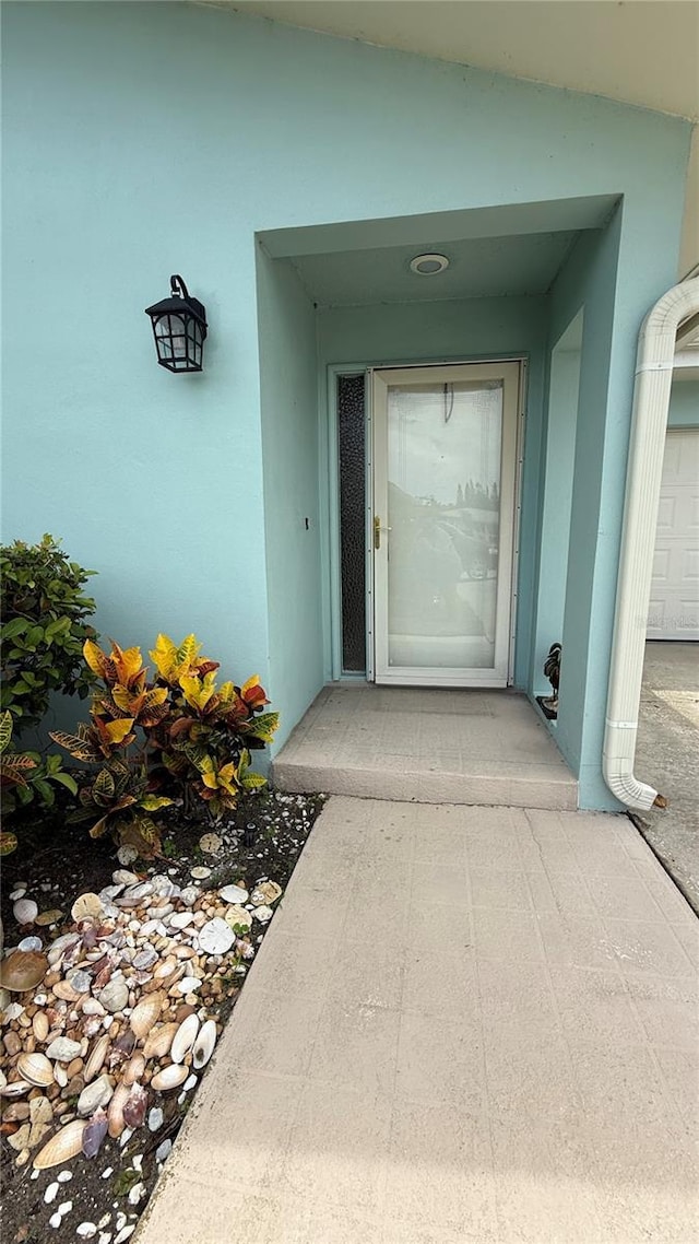 2722 Sherbrooke Ln Unit D, Palm Harbor, FL 34684 - entrance to property featuring stucco siding