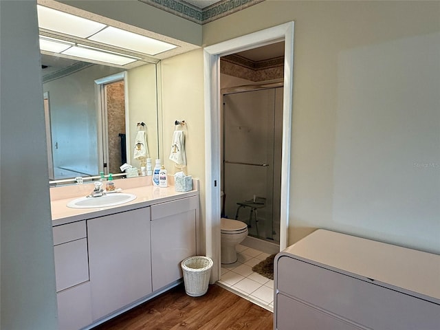 2722 Sherbrooke Ln Unit D, Palm Harbor, FL 34684 - full bath with a shower stall, vanity, and wood finished floors