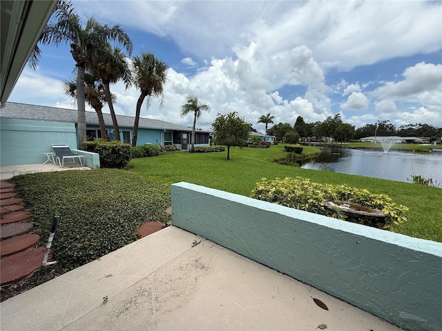 2722 Sherbrooke Ln Unit D, Palm Harbor, FL 34684 - view of patio / terrace featuring a water view