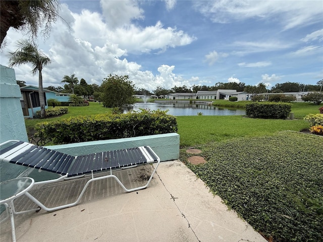 2722 Sherbrooke Ln Unit D, Palm Harbor, FL 34684 - view of patio with a water view