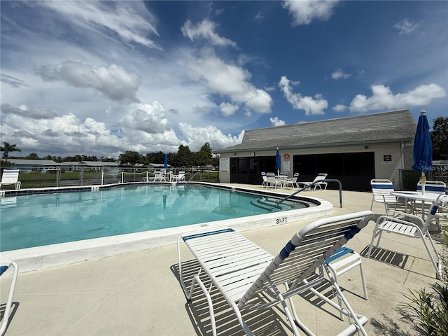 2722 Sherbrooke Ln Unit D, Palm Harbor, FL 34684 - community pool featuring a patio area