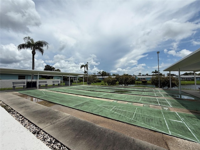 2722 Sherbrooke Ln Unit D, Palm Harbor, FL 34684 - view of home's community featuring shuffleboard