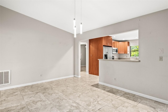 2986 Cypress Green Dr, Palm Harbor, FL 34684 - unfurnished living room featuring baseboards