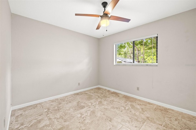 2986 Cypress Green Dr, Palm Harbor, FL 34684 - empty room featuring ceiling fan and baseboards