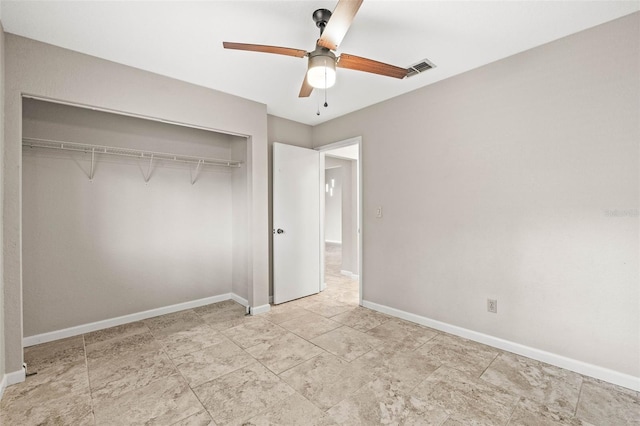 2986 Cypress Green Dr, Palm Harbor, FL 34684 - unfurnished bedroom featuring a closet and a ceiling fan
