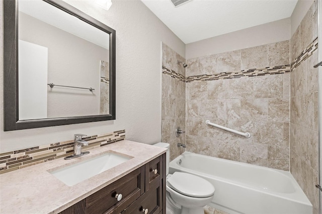 2986 Cypress Green Dr, Palm Harbor, FL 34684 - bathroom with vanity, tub / shower combination, and tasteful backsplash