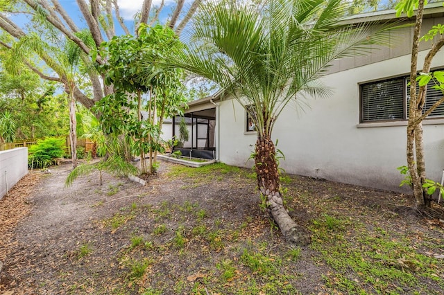 2986 Cypress Green Dr, Palm Harbor, FL 34684 - view of yard with a sunroom