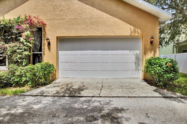 7310 S Shamrock Rd, Tampa, FL 33616 - garage featuring driveway