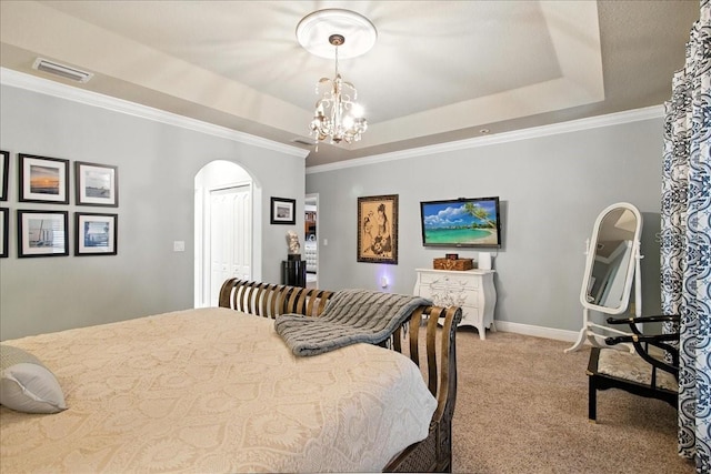 7310 S Shamrock Rd, Tampa, FL 33616 - bedroom with carpet flooring, a chandelier, arched walkways, crown molding, and a raised ceiling