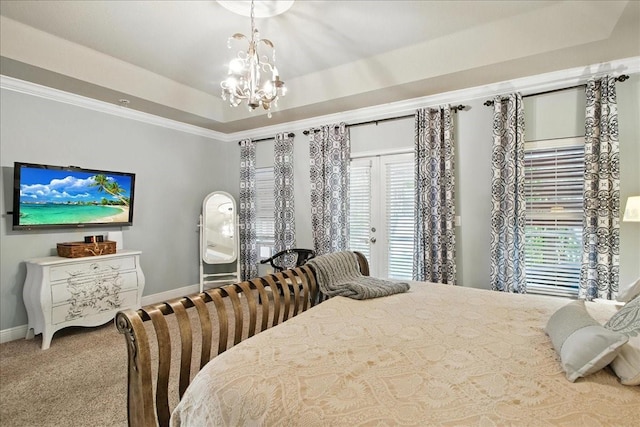 7310 S Shamrock Rd, Tampa, FL 33616 - bedroom with multiple windows, carpet floors, a tray ceiling, ornamental molding, and a chandelier