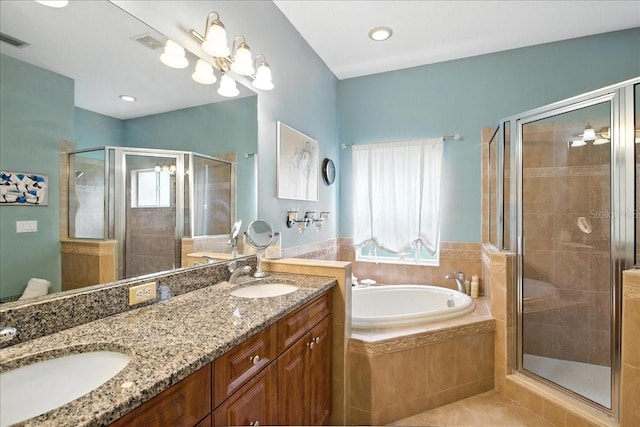 7310 S Shamrock Rd, Tampa, FL 33616 - full bath with healthy amount of natural light, a garden tub, and a stall shower