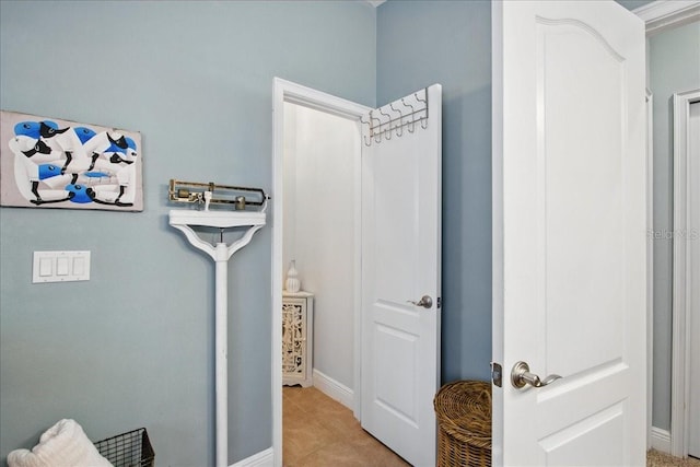 7310 S Shamrock Rd, Tampa, FL 33616 - tiled bedroom featuring baseboards