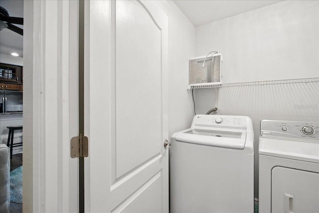 7310 S Shamrock Rd, Tampa, FL 33616 - laundry room with washing machine and clothes dryer