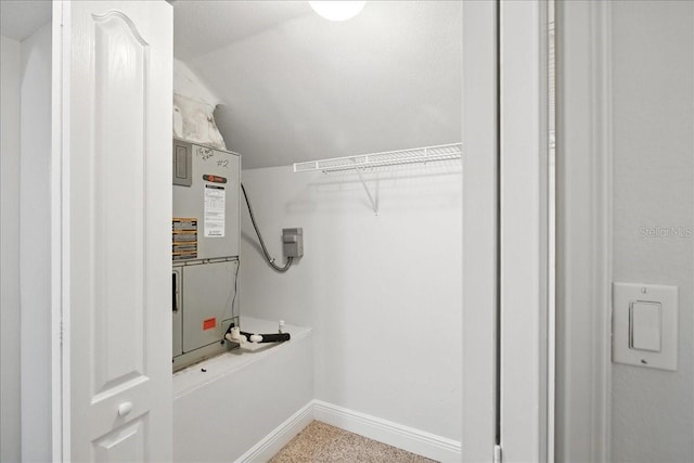7310 S Shamrock Rd, Tampa, FL 33616 - walk in closet with vaulted ceiling and heating unit