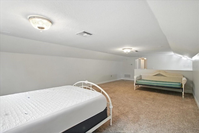 7310 S Shamrock Rd, Tampa, FL 33616 - carpeted bedroom featuring vaulted ceiling and baseboards