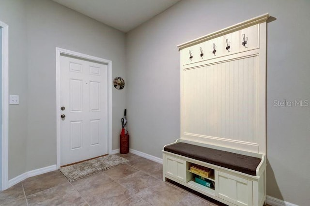 6395 Cobble Bliss St, Zephyrhills, FL 33541 - mudroom featuring baseboards