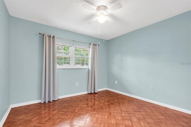 845 Maple Ct Unit 103, Dunedin, FL 34698 - unfurnished room with a textured ceiling and a ceiling fan