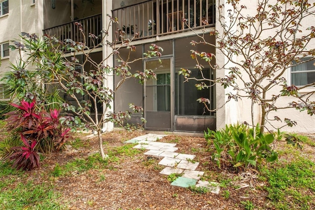 845 Maple Ct Unit 103, Dunedin, FL 34698 - property entrance featuring a balcony