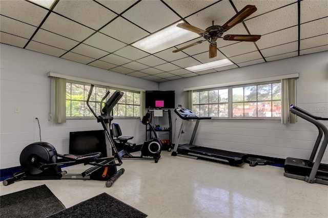 845 Maple Ct Unit 103, Dunedin, FL 34698 - workout area featuring a drop ceiling, healthy amount of natural light, and ceiling fan