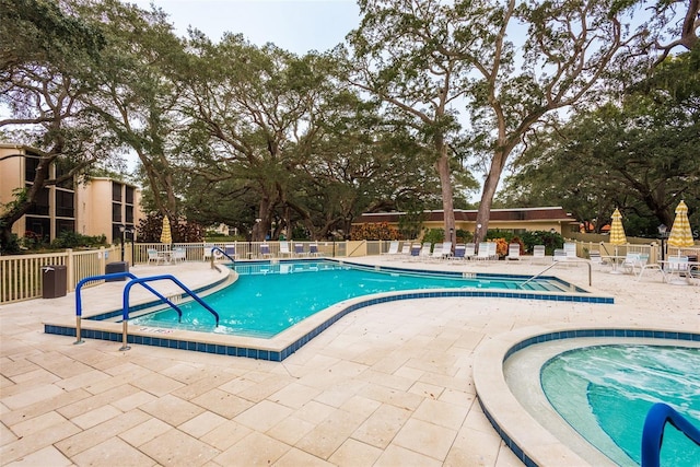 845 Maple Ct Unit 103, Dunedin, FL 34698 - community pool with a patio