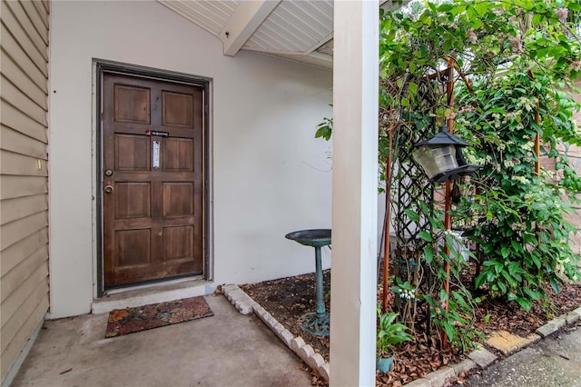 3129 W Paris St, Tampa, FL 33614 - property entrance featuring stucco siding