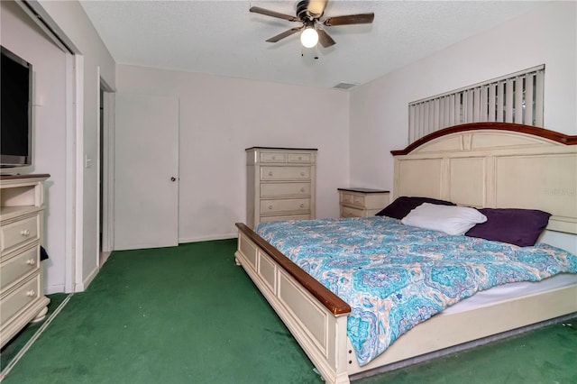3129 W Paris St, Tampa, FL 33614 - carpeted bedroom featuring a textured ceiling and a ceiling fan