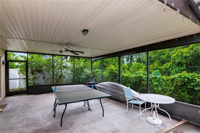 3129 W Paris St, Tampa, FL 33614 - sunroom with a ceiling fan and outdoor dining space