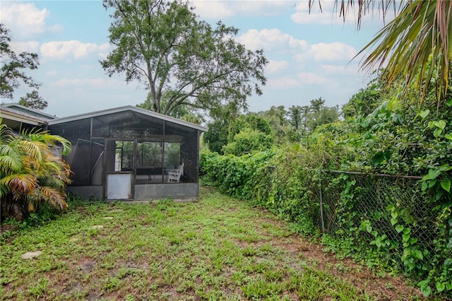 3129 W Paris St, Tampa, FL 33614 - view of yard featuring a sunroom